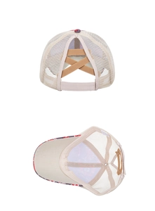 Detail of messy bun mesh baseball cap showing elastic criss-cross bands and floral lining
