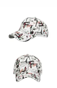 Detailed views of a white baseball cap featuring vintage French Eiffel Tower and art prints