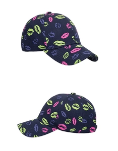 Detail view of navy baseball cap with vibrant neon lip print pattern from multiple angles