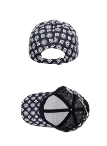 Detailed view of dark blue embroidered baseball cap showing adjustable strap and inner lining
