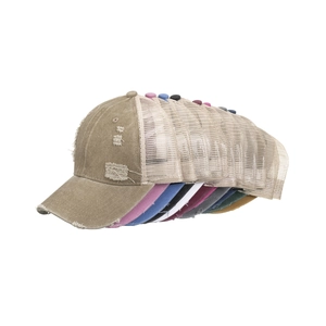 Distressed vintage trucker caps in multiple colors with mesh back and frayed edge design