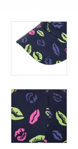 Detail shot of the twill fabric texture and colorful lip prints on the navy baseball cap