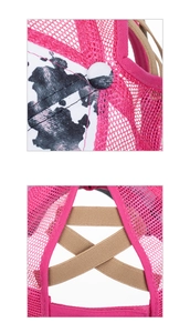 Detail of pink mesh baseball cap with cow print panels and ponytail elastic back design