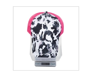 Detailed scale view of a lightweight 70g cow print baseball cap with pink mesh panels