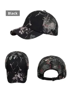 Three-view display of black baseball cap with traditional embroidery and mesh back