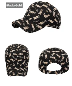 Detailed views of black baseball cap with golden rabbit print and adjustable metal buckle