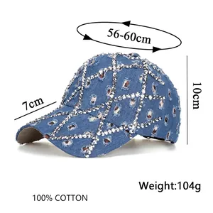 Blue denim baseball cap for women with silver rivets and distressed details, sizing chart shown