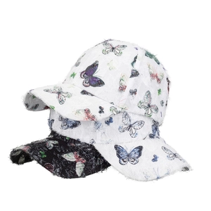 Vintage style baseball caps with colorful butterfly prints and distressed edges in white and black