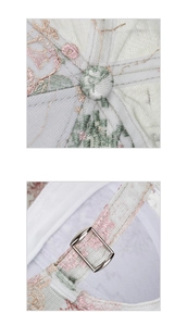 Close-up of floral embroidery on lace baseball cap with metal buckle adjustment detail