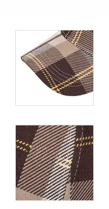 Close-up of British plaid baseball cap showing brown checkered fabric and yellow stitching