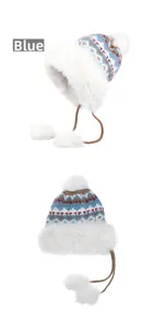 Detail of winter warm trapper hat with blue jacquard pattern and soft faux fur lining