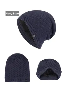 Detailed macro view of navy blue beanie with warm fleece lining and spiral knit texture