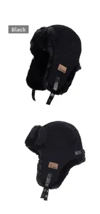 Detail of black aviator hat featuring warm fleece lining and leather strap with buckle