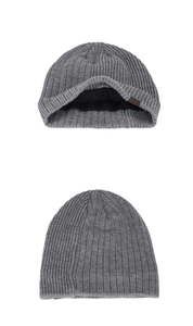 Detail of warm grey knit beanie showing thick black fleece lining and ribbed texture