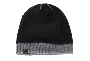 Detailed close-up of a two-tone winter beanie with ribbed edge and leather logo patch
