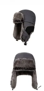 Detailed close-up showing windproof fabric and thick faux fur lining of the dark gray trapper hat