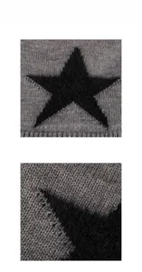 Gros plan sur la texture tricotée grise et le motif d'étoile noire en peluche du bonnet d'hiver