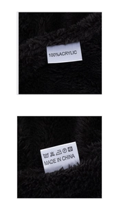 Detailed macro view of 100% acrylic material tag and black faux fur texture of the winter hat