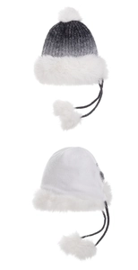 Detailed texture of thick winter trapper hats with faux fur lining and soft pom-poms