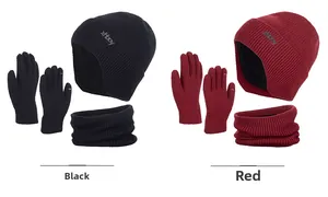 Detail view of winter knit hat, neck warmer and gloves set in black and red colors