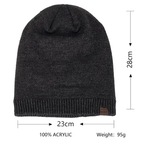 Mens dark grey winter knit beanie with soft fleece lining and warm ribbed texture