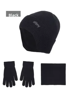 Three-piece black winter knit set including earflap hat, gloves and neck warmer