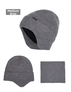 Detail of medium heather grey knitted beanie and neck warmer set with thick fleece lining