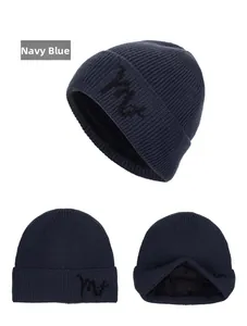 Navy blue ribbed knit beanie with warm fleece lining and black letter embroidery
