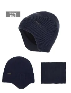 Detail view of navy blue knitted earflap hat and neck gaiter set for winter warmth