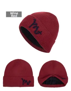 Detailed views of burgundy knit beanie with fleece lining and letter embroidery