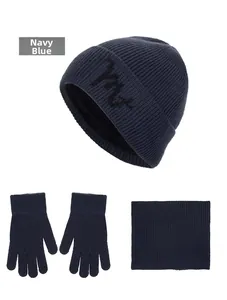 Navy blue winter set including a knit beanie with fleece lining, scarf, and gloves