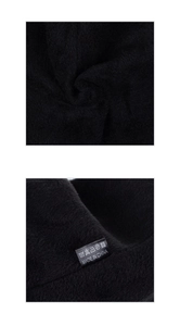 Detail shot of the soft black fleece lining and wash care label on a winter knit hat