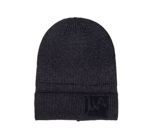 Detailed macro view of the ribbed knit texture and woven logo patch on a warm winter beanie