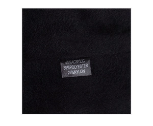 Macro view of inner fleece lining and care label showing material composition on winter hat