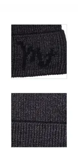 Detailed macro view of dark grey ribbed knit fabric with soft flocking texture