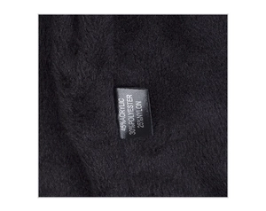 Detail showing material label with 45% acrylic blend for warmth on the winter knit beanie