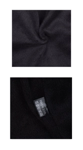 Detail view of the soft black fleece lining texture and garment care label on the winter hat