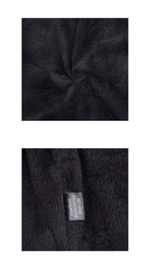 Detail of winter knit hat material label showing 45% Acrylic, 30% Polyester, and 25% Nylon