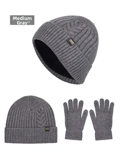 Detail view of medium heather grey knitted beanie and matching gloves set for winter