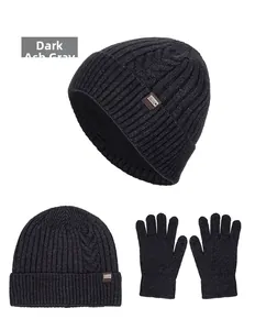 Detailed cable knit pattern on dark heather gray winter hat and matching gloves set