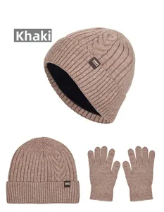 Detail view of khaki knitted winter hat and gloves set with warm thick fleece lining