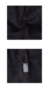 Detail des Textiletiketts mit der Zusammensetzung aus 45% Acryl und 30% Polyester
