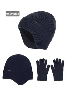 Detail of navy blue winter knit beanie and gloves set with thick fleece lining