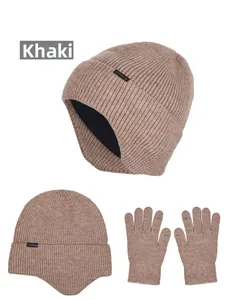 Detailed view of khaki winter knit beanie with earflaps and matching gloves with fleece lining
