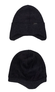 Detail of warm black knit earflap hat showing thick fleece lining and metal branding