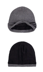 Detailed view of winter knit beanie with warm fleece lining and brand metal plate