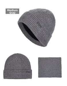 Detail view of medium grey rib-knit beanie hat and matching neck warmer scarf set