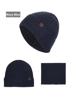 Detail of navy knit beanie and neck warmer set with warm fleece lining and ribbed texture