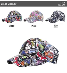 Detail view of graffiti style sun hats in blue, pink and navy with sneaker print