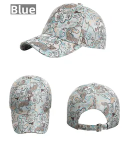 Detailed views of the blue jacquard baseball cap with traditional ethnic patterns